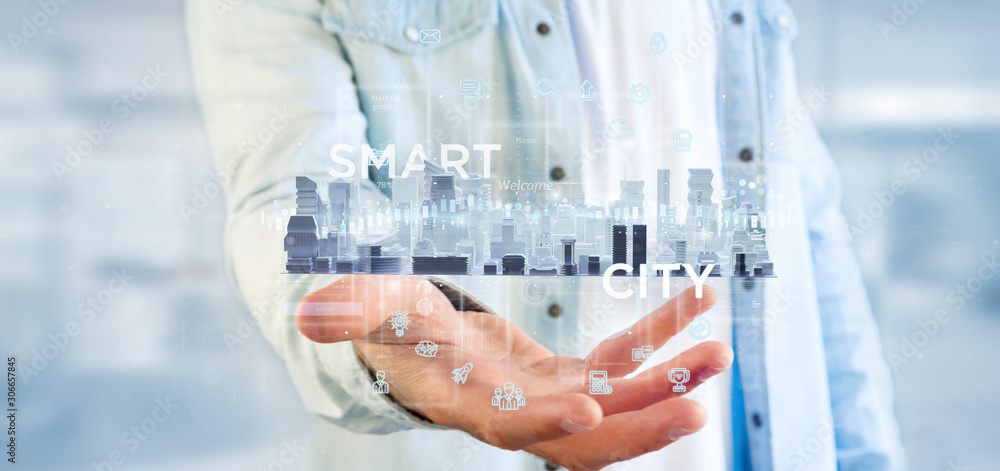 Poster businessman holding smart city user interface with icon, stats and data 3d rendering