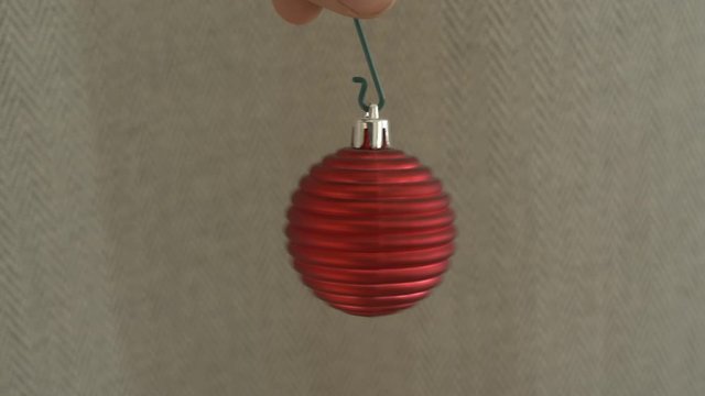 red round christmas bauble decoration hung up