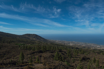 View from the peak of Mount Teide on the Island of Tenerife showing the deep blue sky