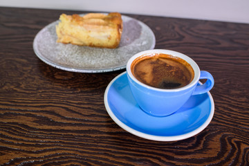 Charlotte of pears and cappuccino on a white background