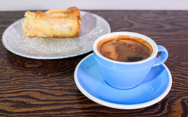 Charlotte of pears and cappuccino on a white background