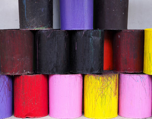 Colorful cans paints brush palette background.