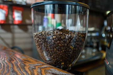 Roasted coffee chamois in a coffee machine flask ready for use