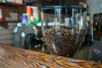 Roasted coffee chamois in a coffee machine flask ready for use