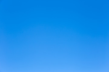 Fototapeta na wymiar Real clear blue sky for background or backdrop.