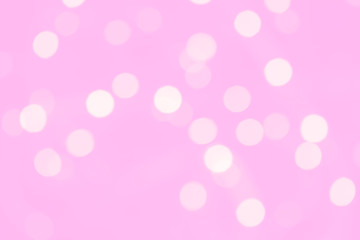 Cute girly pastel pink background with blurred bokeh lights