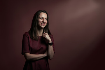 Amazing Grace concept. Portrait of happy woman talking to God over purple background. Copy-space....