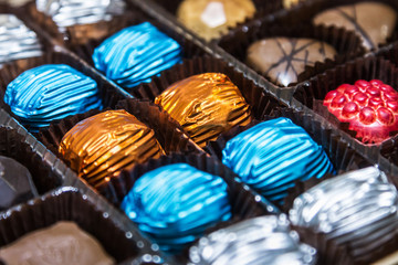 chocolates with different fillings are in the box. set of chocolates