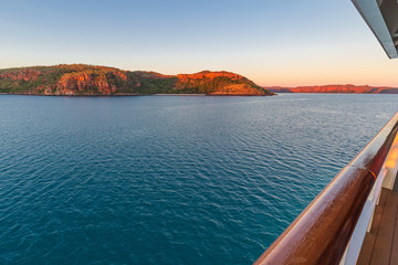 Sunset view of Prince Frederick Harbor in the remote Kimberley coast of Western Australia from the deck of an anchored expedition cruise ship.