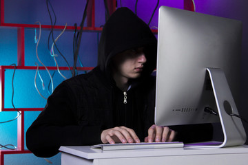 hacker near the computer
