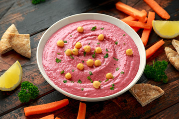Beetroot Hummus with chickpea, olive oil, lemon, carrots and pita bread