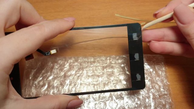 replacement of broken smartphone screen, cell phone repair
