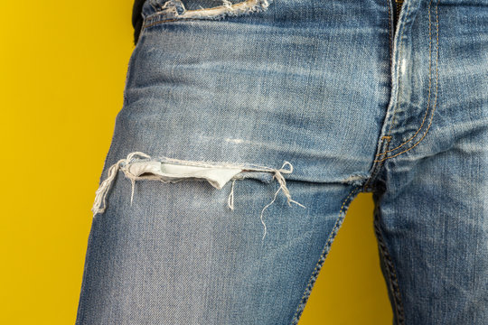 blue jeans pocket in yellow background