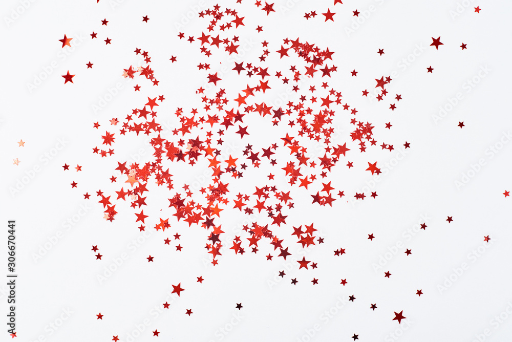 Poster abstract background with red confetti in shape of star on a white background