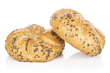 Group of two whole sesame kaiser roll isolated on white background