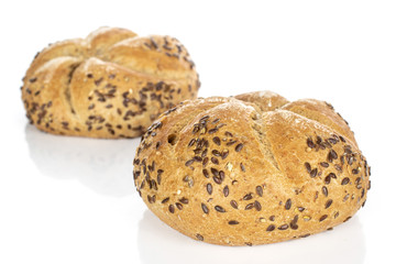 Group of two whole sesame kaiser roll isolated on white background