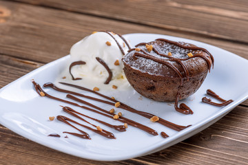 Mouth watering delicious chocolate fondant cake, restaurant serving.