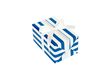 Christmas or other holiday handmade present in blue paper with white ribbon. Isolated on white background, top view. thanksgiving Gift box concept