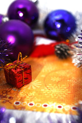 Christmas background with balls and gift, greeting card