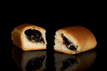 Group of two whole sweet czech bun isolated on black glass