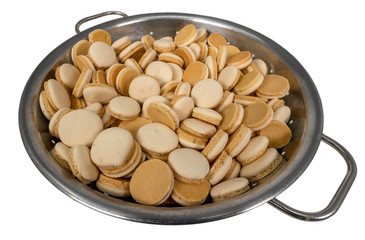 Homemade anise christmas cookies in a metal bowl isolated
