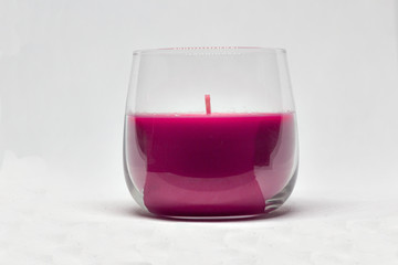A candle with a white background, relaxation, spa
