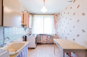 Russia, Moscow- July 23, 2019: interior room apartment. standard repair decoration in hostel. kitchen and dining room