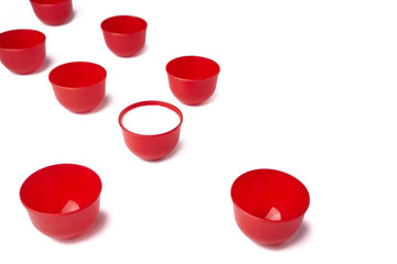 Set of Red cups on table isolated on white background
