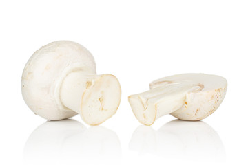 Group of one whole one half of fresh white champignon isolated on white background
