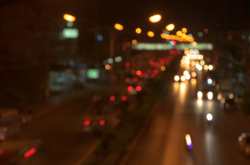 Fototapeta na wymiar Out of focus, Traffic and lights of cars in night time