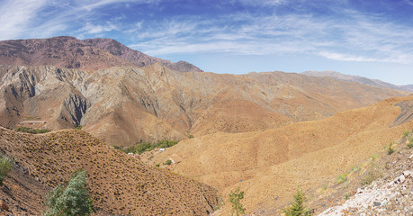 Panorama of the arid mountains on the Tizi n'Tichka pass on road 9 from Marrakech to Ouarzazate