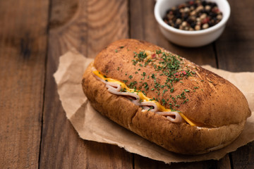 bread ham cheese on wood