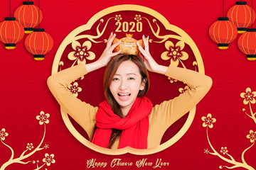 asian young woman celebrating for chinese new year. chinese text happy new year 2020