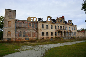 Fototapeta na wymiar The ruins of an old abandoned estate