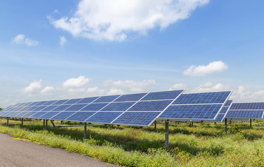 Rows array of polycrystalline silicon solar cells or photovoltaic cells in solar power plant station turn up skyward absorb the sunlight from the sun alternative renewable energy from the sun