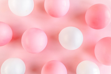 Balloons on pink background. Valentines day, Birthday, holiday concept. Flat lay, top view