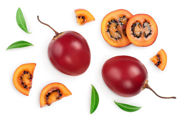 Fresh tamarillo fruit with leaves isolated on white background. Top view. Flat lay