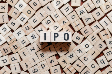 IPO - Initial Public Offering word concept on cubes