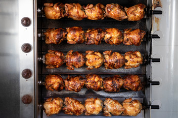 Roast chickens on roasting machine