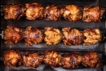 Roasted chicken in roasting machine