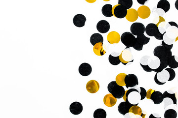 Colorful paper confetti on white background. Celebration concept. Flat lay. Top view.