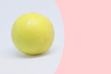 A whole lemon isolated on white background