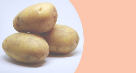 Fresh potatoes on white background
