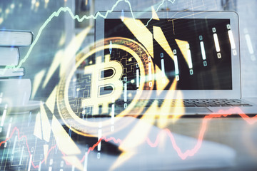 Multi exposure of blockchain theme hologram and table with computer background. Concept of bitcoin...