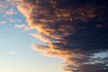 Naklejka na ściany i meble Clouds on sunset, amazing sky, nature background