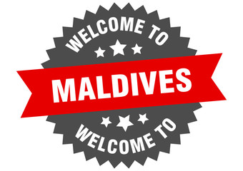 Maldives sign. welcome to Maldives red sticker