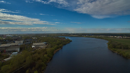 Aerial landscape with river, town, nature and blue sky