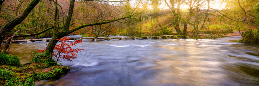 Tarr Steps With A Full Flowing River Barle And Autumn Colours, Exmoor