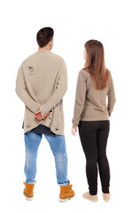 Back view of couple. beautiful friendly girl and guy together.