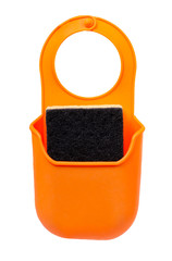 Kitchen sponge hanger, orange silicone utensil. Isolated on white.